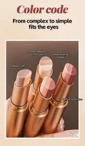 Detailed view of four gradient eyeshadow sticks in matte and shimmering earth tones.