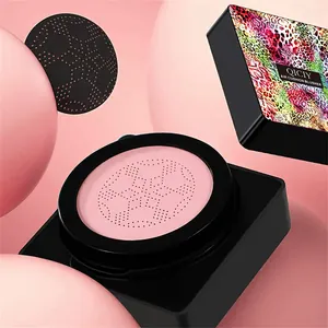 Close-up of pink air cushion blusher with colorful animal print case and sponge