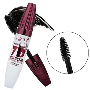 QICIY 7D Colossal Volume Express mascara showing brush head and black texture smudge