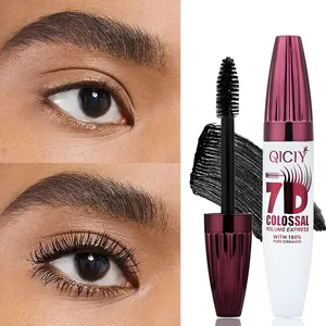 Detailed macro of QICIY 7D black mascara showing thickening effect and wand brush.
