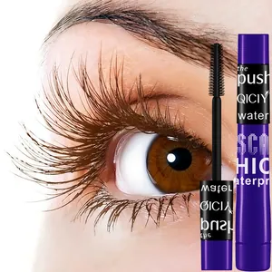 Detail view of QICIY waterproof mascara brush and long-lasting curling effect on brown lashes