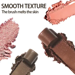 Macro view of smooth creamy eyeshadow stick textures in earthy and coral tones