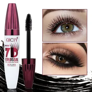 Detail view of QICIY 7D black mascara wand and bottle with dramatic eyelash volume results