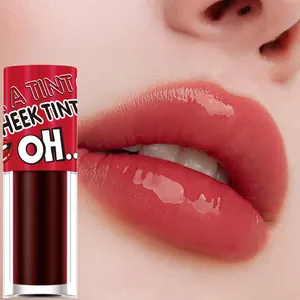 Macro view of glossy pink gel lip tint application and minimalist product packaging detail