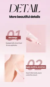 Close-up of portable perfume pen with brush head for easy application on skin.