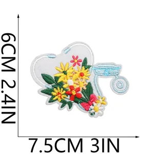 Close-up of medical stethoscope flower embroidered patch with 7.5x6cm dimension lines.