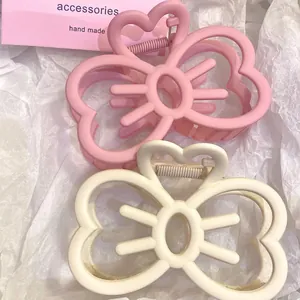 Pinces à cheveux kawaii mates rose et crème avec noeud en cœur pour coiffure épaisse