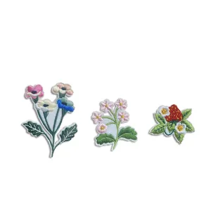 Set of floral and strawberry embroidered iron-on patches for DIY clothing decor