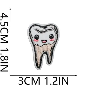 Detailed size view of cartoon tooth embroidery patch showing 4.5cm by 3cm dimensions