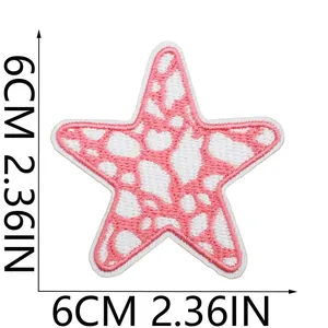 Detailed view of a pink star embroidered patch showing exact 6cm by 2.36in dimensions