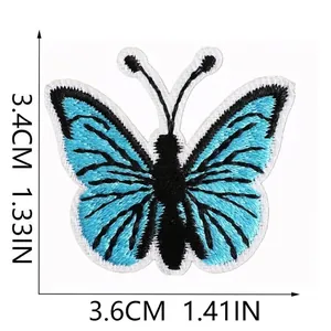 Toppa ricamata farfalla blu per decorazione vestiti, 3,4 x 3,6 cm.