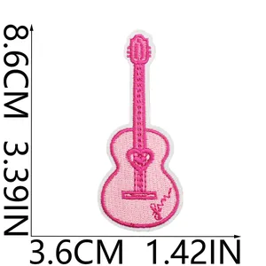 Detail view of pink guitar embroidered patch with heart and size dimensions