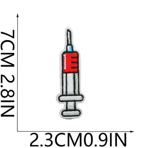 Detailed view of a cartoon medical syringe embroidery patch showing precise dimensions