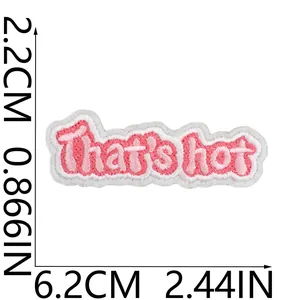 Pink embroidered iron-on patch with That's hot slogan text detail view