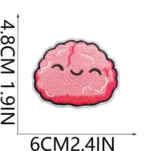 Close-up of cute cartoon brain embroidered patch showing 6cm x 4.8cm dimensions