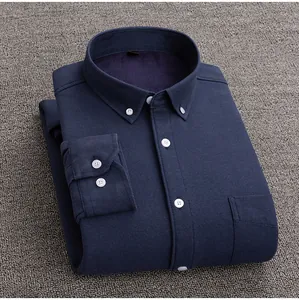 Premium navy blue men's fleece-lined Oxford casual shirt showing folded texture detail