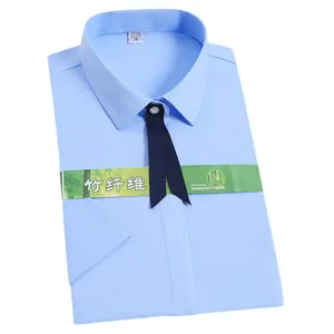 Short-sleeved light blue women's bamboo fiber formal shirt with navy blue bow tie accessory