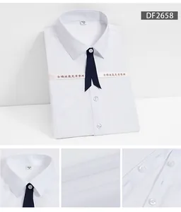 Vue détaillée de la texture du tissu et des boutons d'une chemise professionnelle blanche.