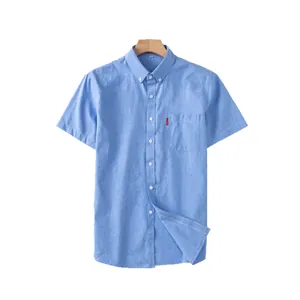 Classic light blue short sleeve oxford cotton shirt for men on a wooden hanger