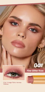 Close-up detail of Fine Glitter Rose eyeshadow stick on model with pink vintage makeup
