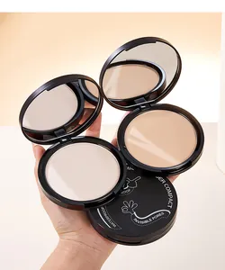 Close-up of black waterproof powder compact showing matte texture and mirror