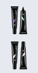 Detailed view of ADMD makeup primer tubes showing green, purple, and nude color swatches