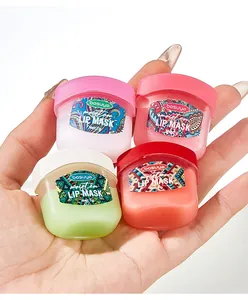 Detailed view of four colorful Bosuya moisturizing lip mask jars held in hand