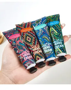 Close-up detail of four vibrantly patterned hand cream tubes from the Bosuya moisturizing set