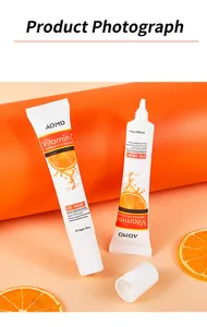 Macro detail of ADMD Vitamin C eye cream tubes with orange extract and hydration