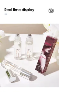 Λεπτομερής λήψη των φιαλιδίων αρώματος ADMD Venom rollerball και της συσκευασίας