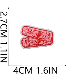 Measurement diagram showing the 2.7x4cm size of cute pink heart bandage embroidered patches.