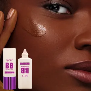 Close-up of QICIY BB cream foundation on dark skin showing soft blur effect texture.