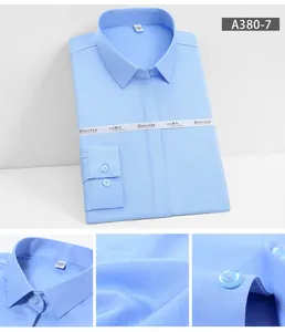 Detail view of light blue long-sleeve business shirt showing fabric texture and buttons