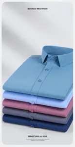 Premium bamboo fiber men's non-iron business shirts shown in a neat folded stack