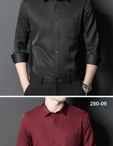 Close-up of slim fit long-sleeve business casual shirts in black and burgundy colors.