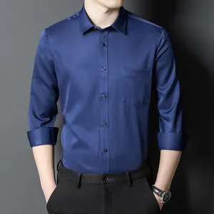 Slim fit navy blue long-sleeve business casual shirt for men shown on model