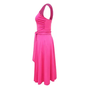 Side view detail of a vibrant magenta summer dress with pleated waist and flared skirt