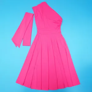 Vibrant pink one-shoulder sleeveless dress with pleated flared skirt and matching sash.