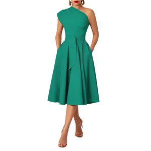 Elegant emerald green one-shoulder flared dress with belted waist and pockets
