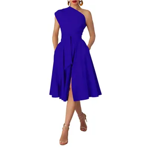 Full view of an elegant royal blue one-shoulder belted dress with side slit detail.