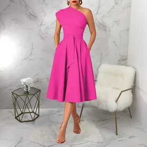 Full view of elegant pink one-shoulder dress with waist tie and flared skirt design