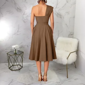 Back view of an elegant brown one-shoulder midi dress with a stylish flared skirt.