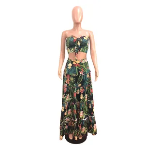 Two-piece tropical floral print beach outfit with bandeau top and tiered maxi skirt