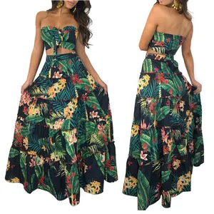 Back and front view of tropical floral print two-piece crop top and tiered maxi skirt set