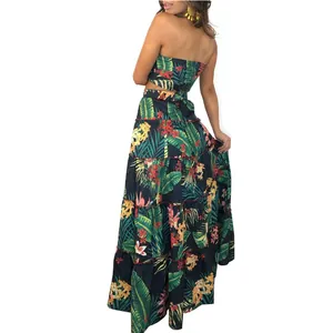 Detailed back view of a woman wearing a tropical floral print two-piece maxi beach skirt set