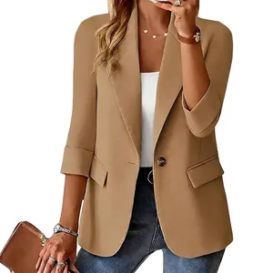 Women's elegant camel blazer with 3/4 sleeves and single button closure detail.
