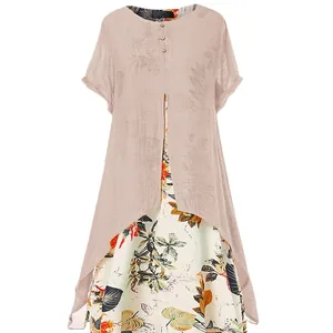 Robe élégante en coton et lin avec patchwork floral, ourlet asymétrique et manches courtes