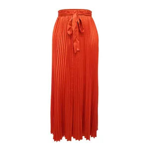 Vibrant orange pleated satin maxi skirt with high waist and elegant self-tie belt detail