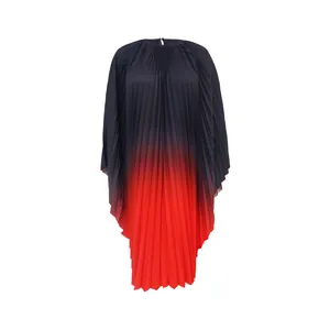 Macro view of gradient red and navy pleated dress with batwing sleeves