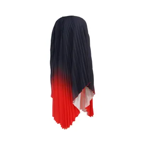 Detail view of a batwing sleeve pleated dress featuring a blue to red gradient.